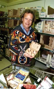 Bruno Brookes Disc jockey and TV Presenter holding open a carton of eggs while doing Bruno Brookes Disc jockey and TV Presenter holding open a carton of eggs while doing