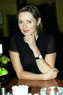 Images Dated 5th June 1998: Carol Vorderman TV Presenter June 1998 Sitting at table A©mirrorpix