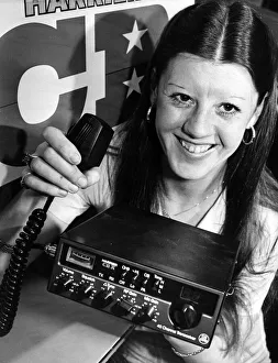 Cashier Doreen Bone of Dixons with one of the new legal CB Radios Cashier Doreen Bone of Dixons with one of the new legal CB Radios