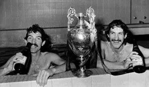 Champagne and a bath for Graeme Souness and Terry McDermott of Liverpool after today' Champagne and a bath for Graeme Souness and Terry McDermott of Liverpool after today'