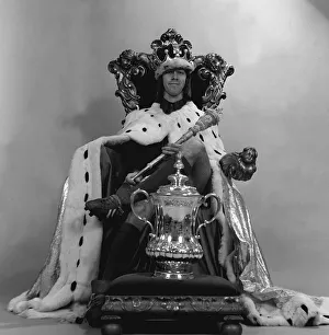 Charlie George sits on the throne as king with FA cup 1972 Charlie George sits on the throne as king with FA cup 1972