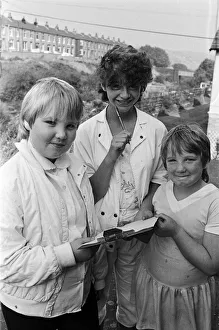 Checking the clues before setting out on a treasure hunt at Marsden are (from left Checking the clues before setting out on a treasure hunt at Marsden are (from left