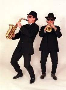 Chelsea footballers Gianfranco Zola and Mark Hughes dressed as the Blues Brothers Chelsea footballers Gianfranco Zola and Mark Hughes dressed as the Blues Brothers