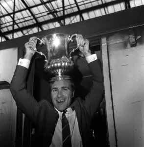 Chelsea Skipper Ron Harris boards the London bound train with the FA Cup after Chelsea Chelsea Skipper Ron Harris boards the London bound train with the FA Cup after Chelsea