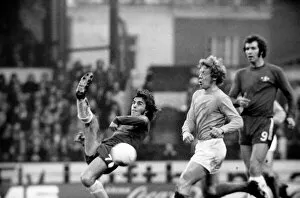 Images Dated 8th January 1972: Chelsea v. Huddersfield. Tony Potrac tries to scissor-kick the ball over defender Hutt as