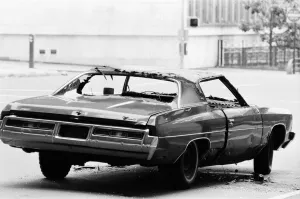 Chevrolet Nova, abandoned and vandalised on the streets of New York, USA, June 1984 Chevrolet Nova, abandoned and vandalised on the streets of New York, USA, June 1984