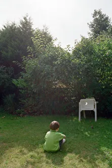 A child watching the solar eclipse indirectly at Hightown. 11th August 1999 A child watching the solar eclipse indirectly at Hightown. 11th August 1999