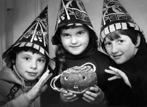 Three children in costume with a turnip lantern for Halloween in October 1979 Three children in costume with a turnip lantern for Halloween in October 1979