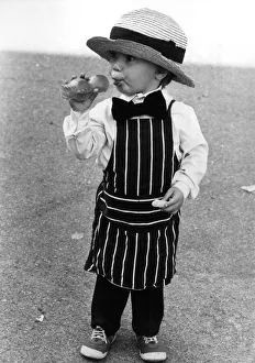 Children: Fancy Dress: Dressed up.... Two-year-old butcher boy Darrell Piper Children: Fancy Dress: Dressed up.... Two-year-old butcher boy Darrell Piper