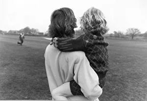 Children Parents a single mum carrying her child both looking into the future Children Parents a single mum carrying her child both looking into the future