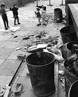 Children playing amongst the rubbish and debris in Halewood, Liverpool Children playing amongst the rubbish and debris in Halewood, Liverpool