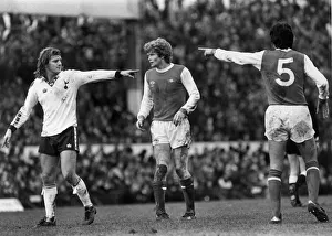 Chris Jones of Spurs (left) and David O Leary (right) pivot round Willie Young Chris Jones of Spurs (left) and David O Leary (right) pivot round Willie Young
