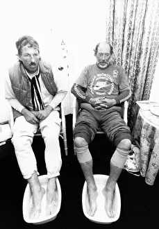 chris lander and Ian Botham soak their feet after a charity walk chris lander and Ian Botham soak their feet after a charity walk