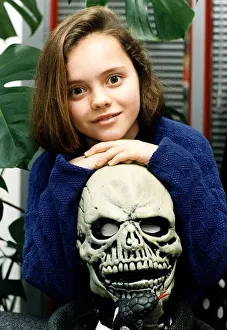 Christina Ricci actress child The Addams Family hands on skull Christina Ricci actress child The Addams Family hands on skull