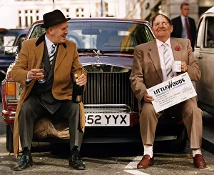 Christopher Hill Littleswoods pools winner sitting on Rolls Royce car bumper with actor Christopher Hill Littleswoods pools winner sitting on Rolls Royce car bumper with actor