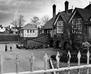 Church Drive Primary Schoolchildren march to classes, Port Sunlight, Merseyside Church Drive Primary Schoolchildren march to classes, Port Sunlight, Merseyside