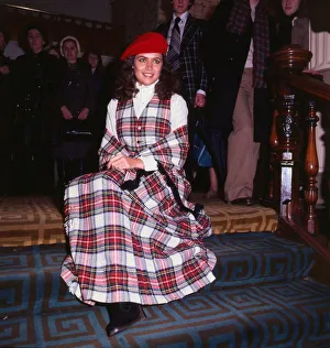 Cindy Breakspeare Miss World 1977 wearing tartan outfit dress sitting on stairs Cindy Breakspeare Miss World 1977 wearing tartan outfit dress sitting on stairs