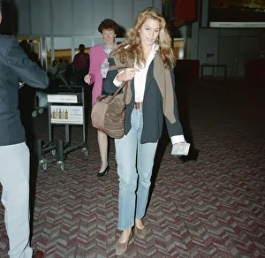 Cindy Crawford (model) at London Heathrow Airport. Cindy is with her husband, actor Cindy Crawford (model) at London Heathrow Airport. Cindy is with her husband, actor