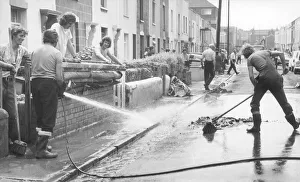 Cleaning up after floods in Lypiatt Road, St George, Bristol in 1974 Cleaning up after floods in Lypiatt Road, St George, Bristol in 1974