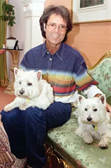 Images Dated 17th June 1995: Cliff Richard with his two dogs. 17th June 1995