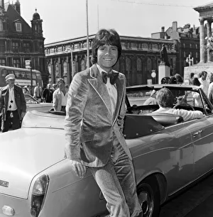 Cliff Richard leaving a Birmingham hotel for location work on his latest film Cliff Richard leaving a Birmingham hotel for location work on his latest film