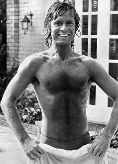 Cliff Richard Singer Actor at his Surrey home after a swim October 1978 Cliff Richard Singer Actor at his Surrey home after a swim October 1978