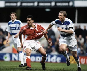 Clive Mendonca of Charlton has his shirt pulled by Tim Breacker of Queens Park Rangers Clive Mendonca of Charlton has his shirt pulled by Tim Breacker of Queens Park Rangers