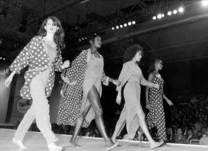 Clothes Show Live, models in spots and dresses slit to the waist stride out Clothes Show Live, models in spots and dresses slit to the waist stride out