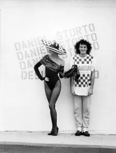 Clothing Beach. Daniel Storto evening swimwear. Model wears swimsuit with tights Clothing Beach. Daniel Storto evening swimwear. Model wears swimsuit with tights