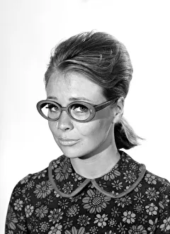 Clothing: Fashion: Spectacle Frames: Woman seen here modelling the latest fashionable Clothing: Fashion: Spectacle Frames: Woman seen here modelling the latest fashionable