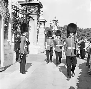 The Coldstream guards seen here mounting the guard at Buckingham Palace The Coldstream guards seen here mounting the guard at Buckingham Palace