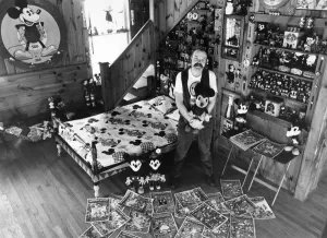 Collection - Mickey Mouse mania. Assistant Professor John Fawcett at his home Collection - Mickey Mouse mania. Assistant Professor John Fawcett at his home