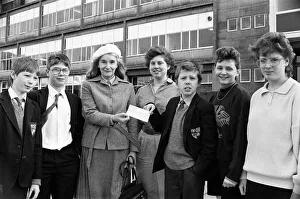 Colne Valley High School pupils hand over a cheque for £118 Colne Valley High School pupils hand over a cheque for £118