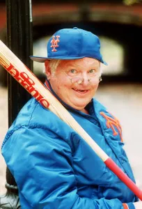 Comedian Benny Hill with baseball bat cap and jacket November 1989 Comedian Benny Hill with baseball bat cap and jacket November 1989
