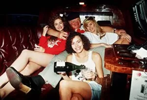 Images Dated 24th April 1992: Comedian Benny Hill in a car with some of his Hills Angels