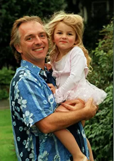Images Dated 12th September 1998: Comedian Rik Mayall with his youngest daughter Bonnie. 12th September 1998