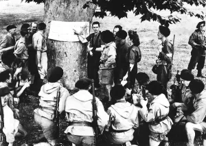 Commandant of a Maquis band briefs his fighters 1944 before a raid against the enemy Commandant of a Maquis band briefs his fighters 1944 before a raid against the enemy