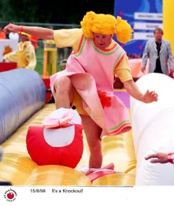Contestants in the TV Programme Its A Knockout Aug 1999 wearing funny costumes playing Contestants in the TV Programme Its A Knockout Aug 1999 wearing funny costumes playing