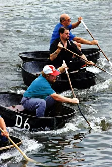 Coracle racing - The tradition of coracle racing returned to the Tywi at the weekend - as Coracle racing - The tradition of coracle racing returned to the Tywi at the weekend - as