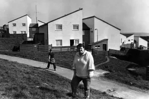 Council tenant liaison officer Denise Yeates outside refurbished houses on the Penrhys Council tenant liaison officer Denise Yeates outside refurbished houses on the Penrhys