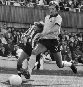 Coventry City's left-back Chris Cattlin in a tackle with Sounthampton' Coventry City's left-back Chris Cattlin in a tackle with Sounthampton'