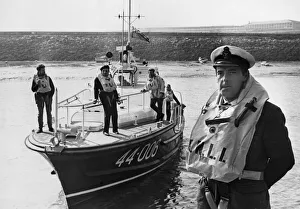 Coxswain Frank Tinsley stands in from of the Barry lifeboat RNLB Arthur Coxswain Frank Tinsley stands in from of the Barry lifeboat RNLB Arthur