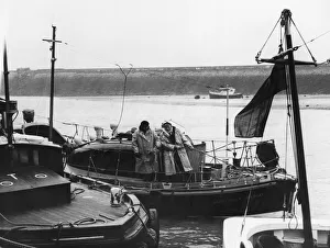 The coxswain, Mr Fred Warts and the signalman Mr John Wells tie up the Barry lifeboat The coxswain, Mr Fred Warts and the signalman Mr John Wells tie up the Barry lifeboat