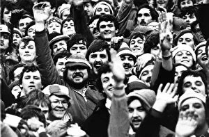 A crowd of happy Welsh fans at Cardiff Arms Park during the rugby game between Wales A crowd of happy Welsh fans at Cardiff Arms Park during the rugby game between Wales