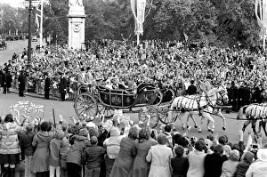 Crowd waving to the carriage of Queen Elizabeth II and Prince Philip Crowd waving to the carriage of Queen Elizabeth II and Prince Philip