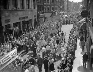Crowds dancing in the street during the Soho Fair in Central London. 10th July 1955 Crowds dancing in the street during the Soho Fair in Central London. 10th July 1955