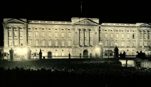 Crowds gather outside the gates of Buckingham Palace following the coronation of George Crowds gather outside the gates of Buckingham Palace following the coronation of George