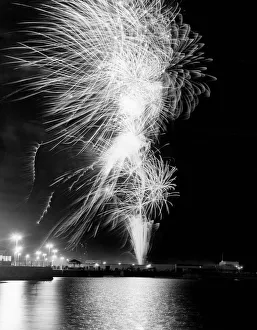 Crowds gather on the sea front and promenade at New Brighton to watch a spectacular Crowds gather on the sea front and promenade at New Brighton to watch a spectacular