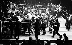 Crowds mob Jimmy Wilde at the end of his fight with Pal Moore after he had beaten Crowds mob Jimmy Wilde at the end of his fight with Pal Moore after he had beaten