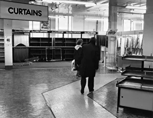 Some of the last customers wander through the empty sales floor as Blackers Department Some of the last customers wander through the empty sales floor as Blackers Department